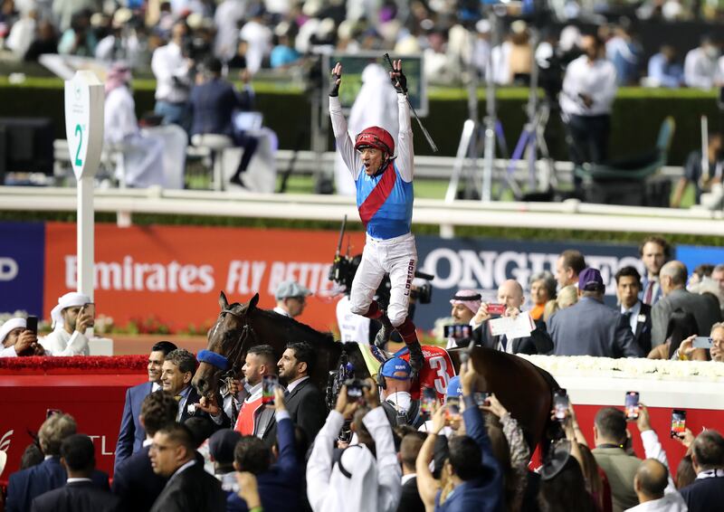 Frankie Dettori celebrates after winning the Dubai World Cup on Country Grammer. Chris Whiteoak / The National