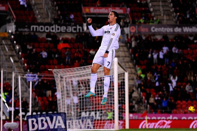 MALLORCA, SPAIN - OCTOBER 28:  Cristiano Ronaldo of Real Madrid CF celebrates after scoring his team's fourth goal during the La Liga match between RCD Mallorca and Real Madrid CF at Iberostar Stadium on October 28, 2012 in Mallorca, Spain.  (Photo by David Ramos/Getty Images)