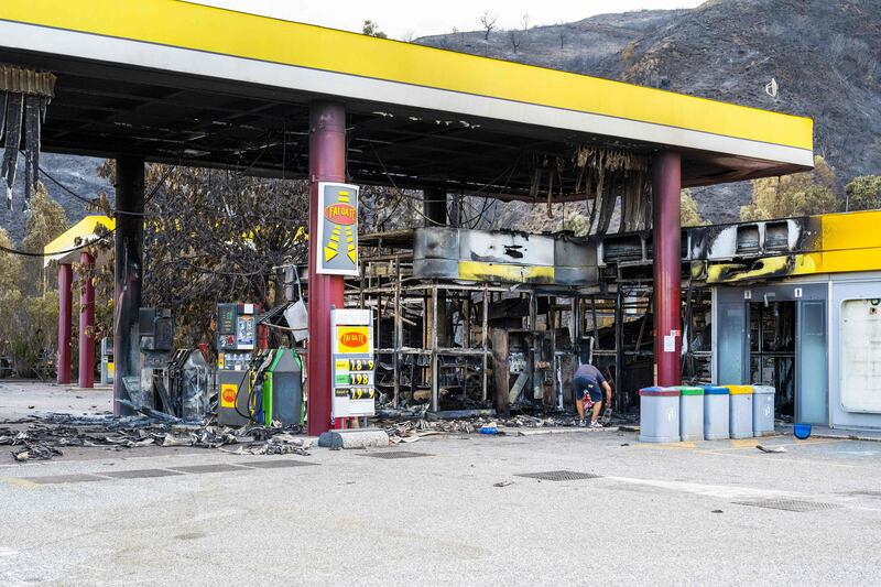 The remains of a petrol station, on the Messina - Palermo motorway after an overnight fire.  AFP