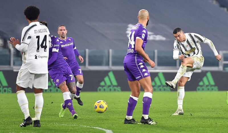 Cristiano Ronaldo takes a shot at goal against Fiorentina. EPA
