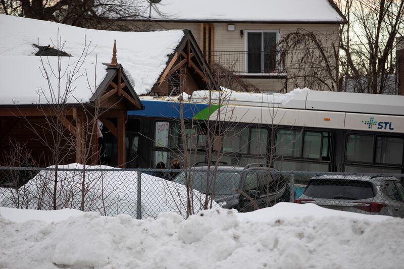 The city bus after it rammed into the Garderie Educative Sainte-Rose nursery