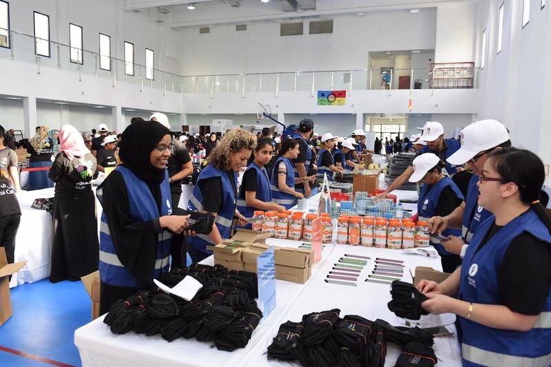 Volunteers help assemble school kits for more than 10,000 pupils. Dubai Cares