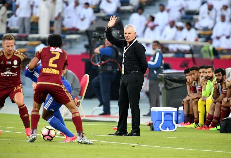 Al Wahda manager Javier Aguirre watches on from the touchline.
