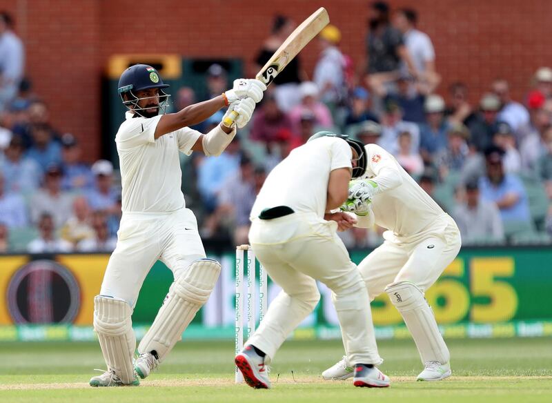 India's Cheteshwar Pujara bats during the first cricket test between Australia and India in Adelaide, Australia,Saturday, Dec. 8, 2018. (AP Photo/James Elsby)