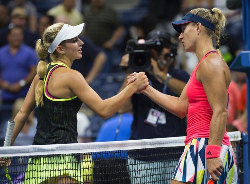 CiCi Bellis of the US, left, and Angelique Kerber of Germany meet at the net after their US Open match on Friday night. Don Emmert / AFP / September 2, 2016