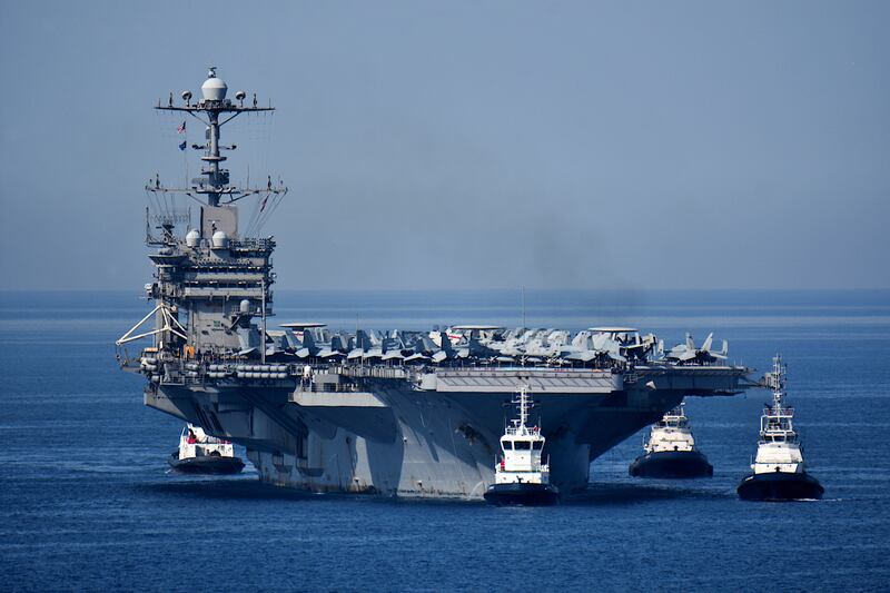 The USS Harry S Truman aircraft carrier in the Mediterranean. Its fighters could be used in air strikes against Houthi rebels, experts say. Getty Images