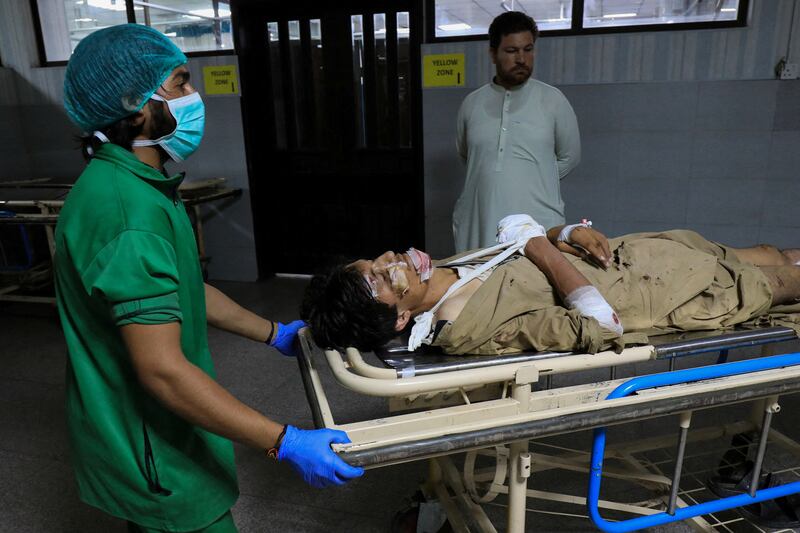 A paramedical staff wheels a man who was injured in the blast in the Bajaur district of Khyber Pakhtunkhwa, at the Lady Reading Hospital in Peshawar, Pakistan. Reuters