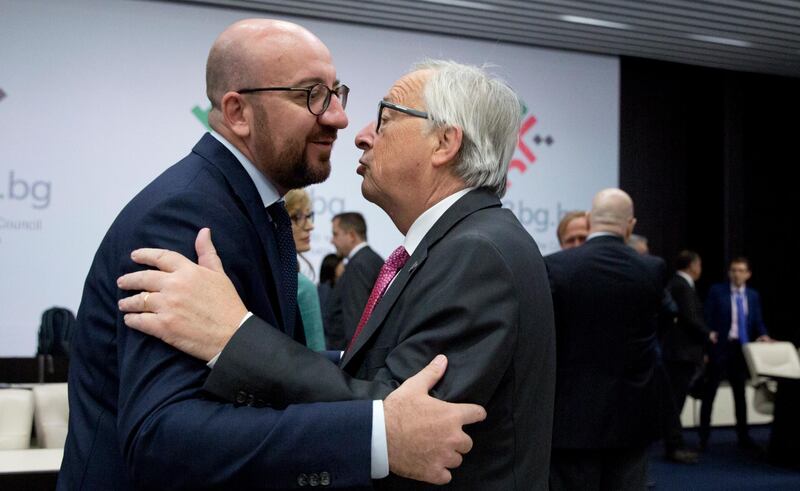 Belgian Prime Minister Charles Michel, left, greets European Commission President Jean-Claude Juncker during a round table meeting of EU and Western Balkan heads of state at the National Palace of Culture in Sofia, Bulgaria, Thursday, May 17, 2018. Virginia Mayo / AP Photo
