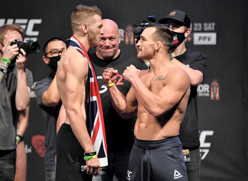 ABU DHABI, UNITED ARAB EMIRATES - JANUARY 22: (L-R) Opponents Dan Hooker of New Zealand and Michael Chandler face off during the UFC 257 weigh-in at Etihad Arena on UFC Fight Island on January 22, 2021 in Abu Dhabi, United Arab Emirates. (Photo by Jeff Bottari/Zuffa LLC) *** Local Caption *** ABU DHABI, UNITED ARAB EMIRATES - JANUARY 22: (L-R) Opponents Dan Hooker of New Zealand and Michael Chandler face off during the UFC 257 weigh-in at Etihad Arena on UFC Fight Island on January 22, 2021 in Abu Dhabi, United Arab Emirates. (Photo by Jeff Bottari/Zuffa LLC)