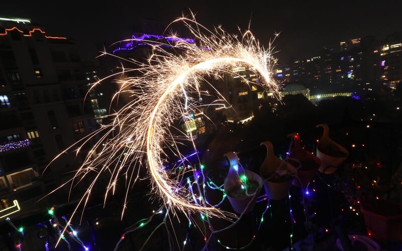 Sparklers light up the night sky during Diwali celebrations near New Delhi. EPA