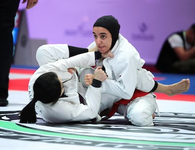The UAE's Hamda Alshkeili, red belt, in action. Victor Besa / The National