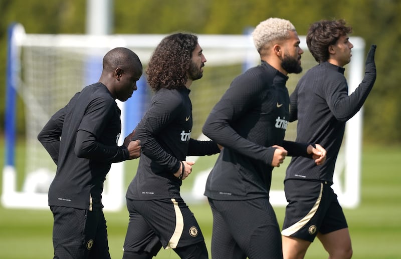 Chelsea's N'Golo Kante, left, Marc Cucurella, Reece James and Joao Felix, right, during training. PA