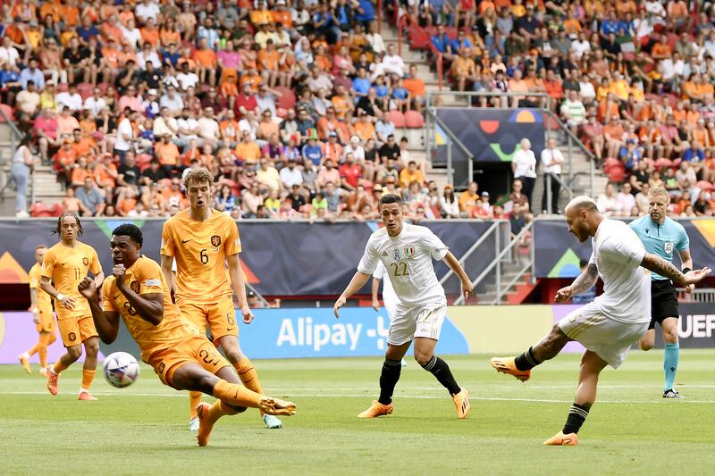 Italy's Federico Dimarco scores his side's opening goal in the Nations League third-place play-off against the Netherlands at De Grolsch Veste Stadium in the Netherlands on Sunday, June 18, 2023. AP