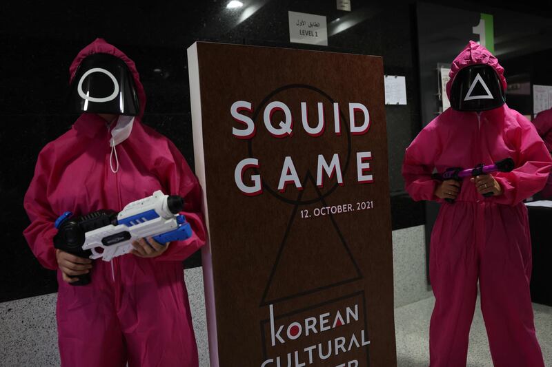 Participants take part in game inspired by Netflix's smash hit 'Squid Game' at the Korean Cultural Centre in Abu Dhabi. AFP