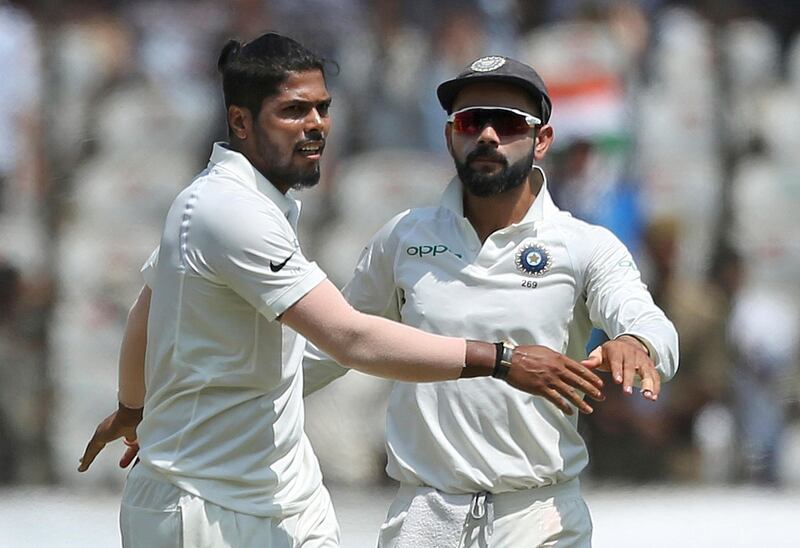 Indian bowler Umesh Yadav celebrates the dismissal of West Indies' Shai Hope during the first day of the second cricket test match between India and West Indies in Hyderabad, India.