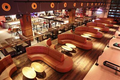 DUBAI, UNITED ARAB EMIRATES , September 27 – 2020 :- View of the sitting area of the 12 bowling lanes at the Brass Monkey, new dining and entertainment destination on the Bluewaters Island in Dubai.  (Pawan Singh / The National) For Lifestyle/Online/Instagram. Story by Janice Rodrigues 
