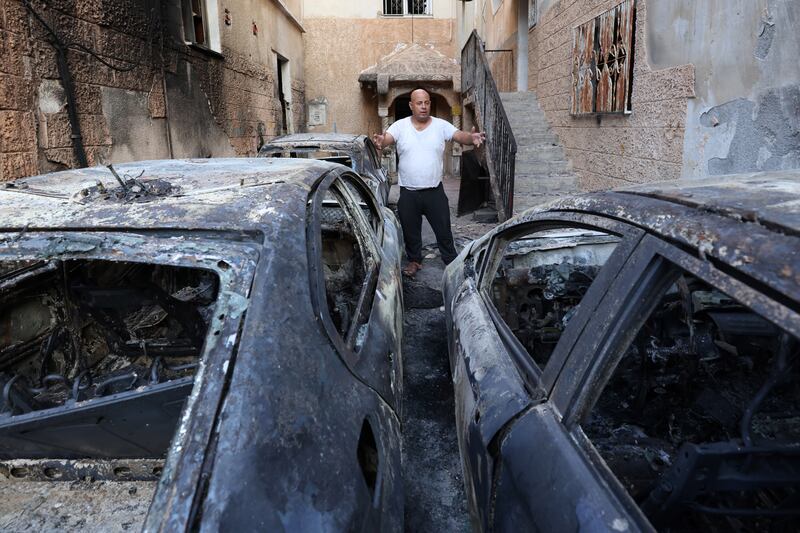 Vehicles destroyed during the raid. EPA