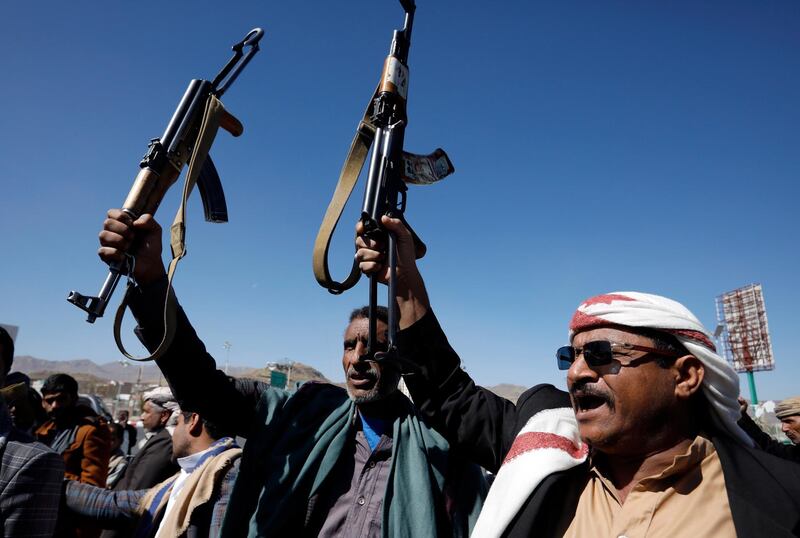 epa08987243 Houthis-allied tribesmen holding up weapons shout slogans during a rally against the US terrorist designation of the Houthis, in Sanaâ€™a, Yemen, 04 February 2021. Yemeni tribesmen loyal to the Houthi movement rallied in Sanaâ€™a against the US decision to designate the movement as a Foreign Terrorist Organization (FTO), calling for an end to US military support for the Saudi-led coalition which has been fighting the Houthis in Yemen for nearly six-years.  EPA/YAHYA ARHAB