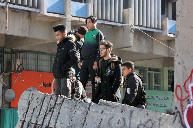 Iraqi anti-government protesteters gather in al-Khillani Square off central Baghdad's Sinak bridge which links the Iraqi capital's Green Zone with the rest of the city.  AFP