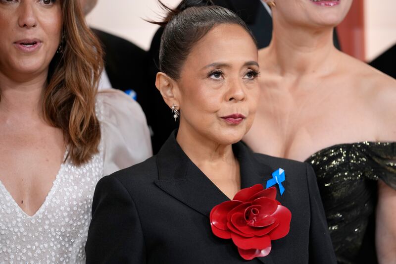 Dolly De Leon with her blue ribbon at the Oscars on Sunday. AP