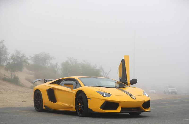 Dubai, United Arab Emirates - Reporter: N/A. News. A Lamborghini parked in Al Qudra in the fog. Thursday, April 8th, 2021. Dubai. Chris Whiteoak / The National