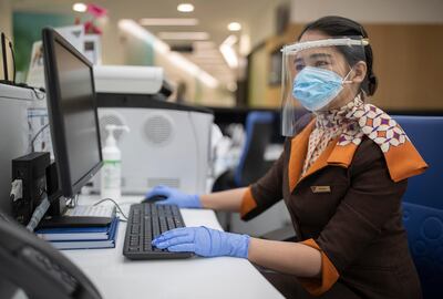 Staff member at Etihad wearing 3D-printed shield mask. Courtesy - Etihad