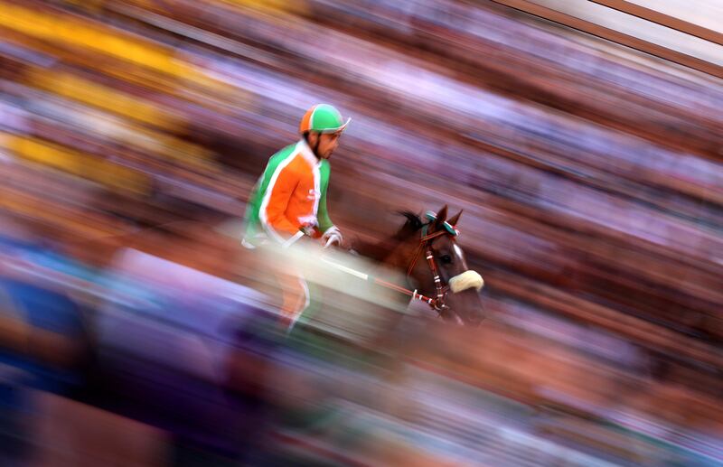 A jockey rides during the second practice for the Palio of Siena. Stefano Rellandini / Reuters.