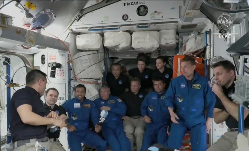 In this image from NASA TV, the four astronauts including United Arab Emirates' Sultan al-Neyadi, third left gather, during the welcoming ceremony, on the International Space Station, Friday, March 3, 2023.  A new crew from the United States, Russia and United Arab Emirates has arrived at the International Space Station.  The new arrivals include United Arab Emirates' Sultan al-Neyadi, the first astronaut from the Arab world who will spend an extended time in space.  Al-Neyadi is only the second person from the UAE to rocket into orbit.  (NASA TV via AP)