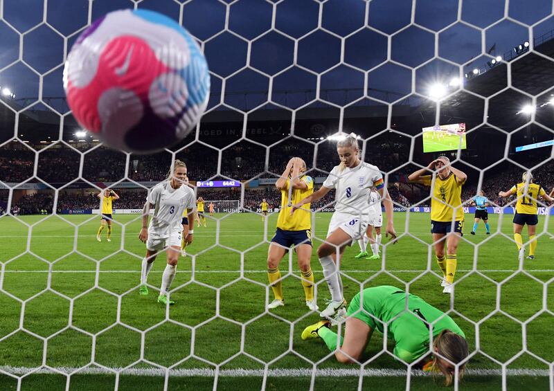 England goalkeeper Mary Earps clears the ball over the crossbar. AFP
