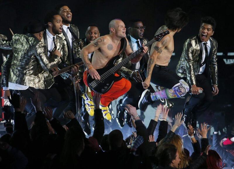 The Red Hot Chili Peppers and Bruno Mars perform during the halftime show of the Super Bowl on Sunday. Matt York / AP 