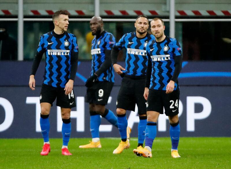 Inter Milan's Christian Eriksen, right, with teammates after the match. Reuters