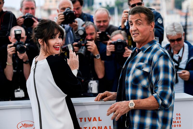 Sylvester Stallone and Paz Vega pose during a photocall for 'Rendez-vous with… Sylvester Stallone' and 'Rambo V : Last Blood' at the 72nd edition of the Cannes Film Festival. Photo: AFP/Christophe Simon