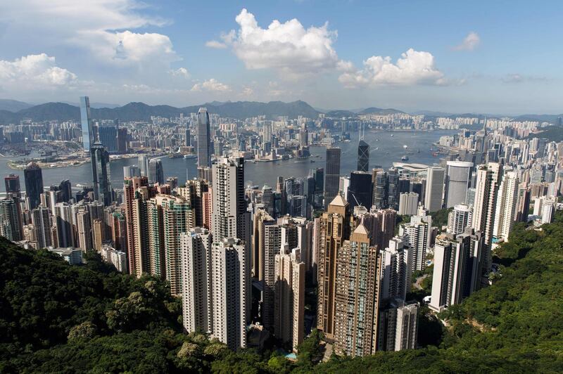 (FILES) In this file photo taken on June 22, 2016, a general view of the Victoria Harbour and the Hong Kong skyline from the Peak, a popular vantage point for tourists, is seen in Hong Kong. Banking giant HSBC on September 27, 2018 hiked its lending rate in Hong Kong for the first time in 12 years, a move that ends an age of cheap cash and could hit the city's famous red-hot property market. / AFP / Anthony WALLACE
