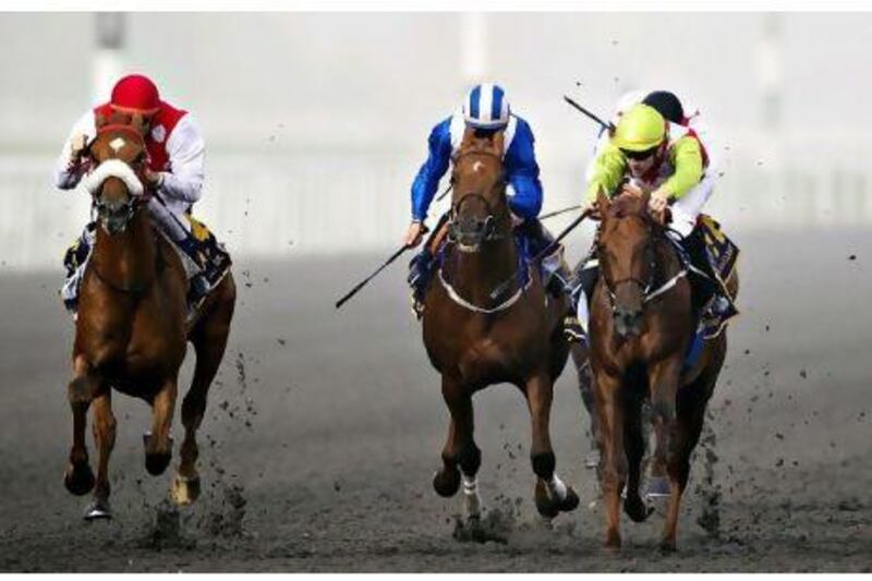 Seraphin Du Paon, left, came from the outside on the final stretch to win the Kahayla Classic yesterday.