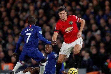 Soccer Football - Premier League - Chelsea v Manchester United - Stamford Bridge, London, Britain - February 17, 2020 Manchester United's Harry Maguire in action with Chelsea's N'Golo Kante and Michy Batshuayi Action Images via Reuters/Matthew Childs EDITORIAL USE ONLY. No use with unauthorized audio, video, data, fixture lists, club/league logos or "live" services. Online in-match use limited to 75 images, no video emulation. No use in betting, games or single club/league/player publications. Please contact your account representative for further details.