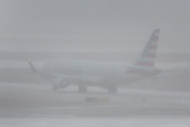 A jet takes off in wintry conditions at O'Hare International Airport, Chicago, Illinois. Getty / AFP 