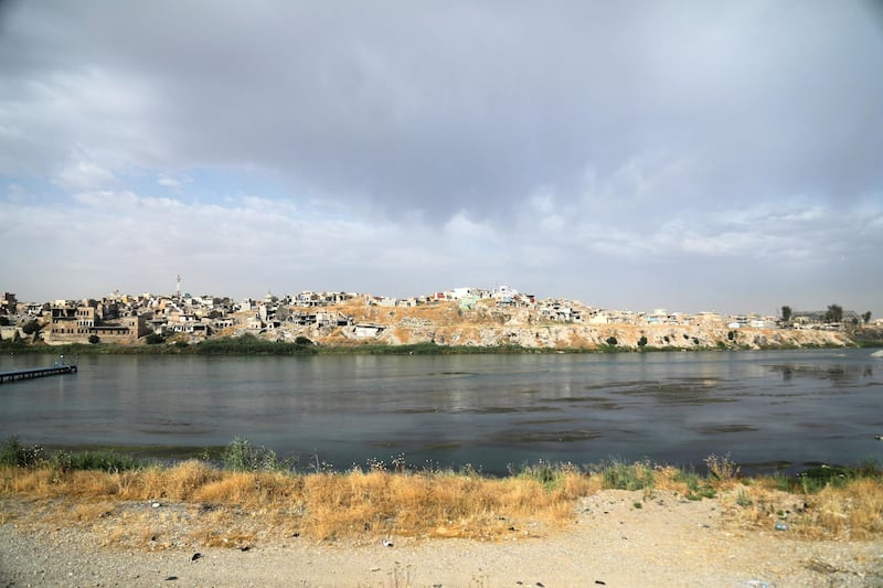 A view shows damaged and destroyed houses in the old city of Mosul on the Tigris River in Mosul, Iraq, June 3, 2020. Picture taken June 3, 2020. REUTERS/Abdullah Rashid    To match Special Report IRAQ-IRAN/MOSUL