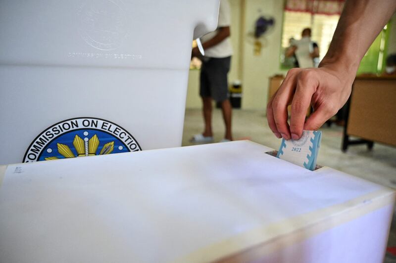 A man casts his vote at a polling station in Manila. AFP