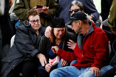 Mourners at the funeral of Israeli army Capt Liron Snir, 25, at the Mount Herzl military cemetery in Jerusalem on Wednesday. He was killed in northern Gaza. Reuters 