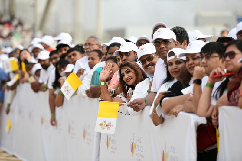 Thousands of different age groups attend for the early morning Papal mass at Bahrain National Stadium, Bahrain. Khushnum Bhandari / The National
