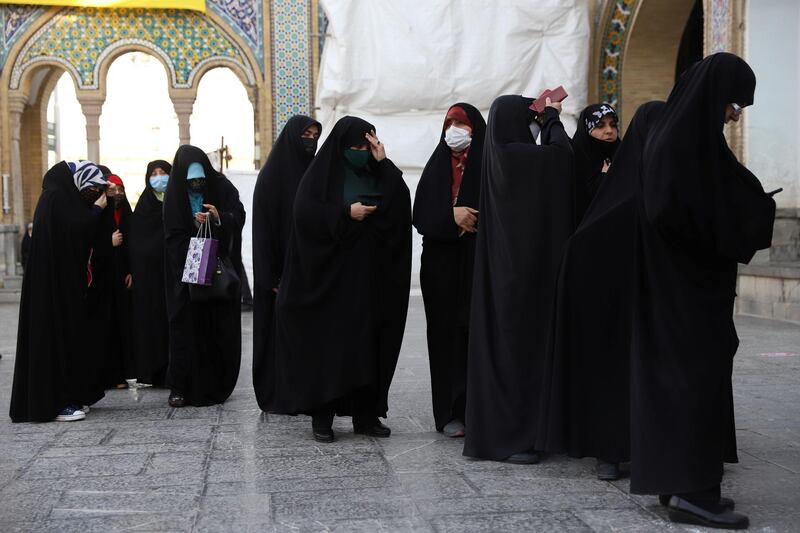 Iranians wait in line to vote at a polling station during presidential elections in Tehran, Iran. Reuters