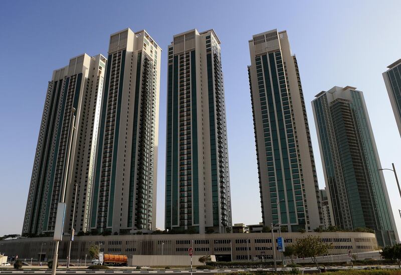 ABU DHABI - UNITED ARAB EMIRATES - 04AUG2015 - Tala tower (R to L) Ocean tower, Marina blue Marina heights-1, Marina heights-2 and Al Maha residential towers on Marina Square on Abu Dhabi's Reem Island. Ravindranath K / The National (fro Business Stock)
 *** Local Caption ***  RK0408-MARINASQUARE02.jpg