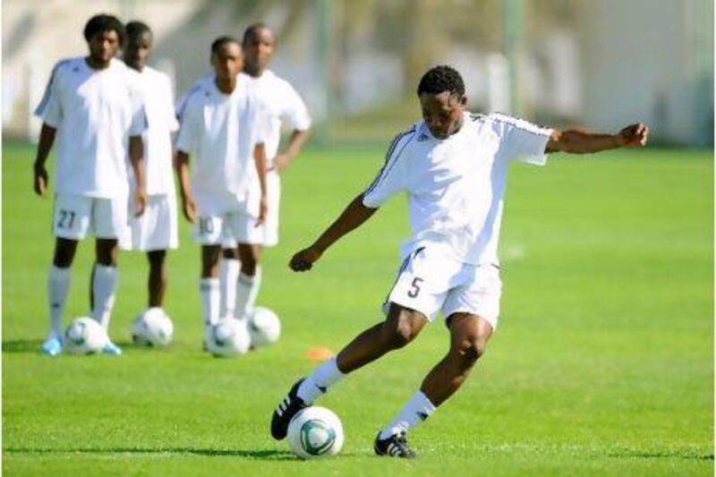 TP Mazembe’s Mukinay Tshani takes a shot during a training session in Abu Dhabi this week.