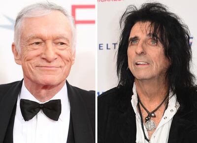The late 'Playboy' publisher Hugh Hefner persuaded nine friends and local companies, including rocker Alice Cooper, to donate money to restore the Hollywood sign. Getty Images