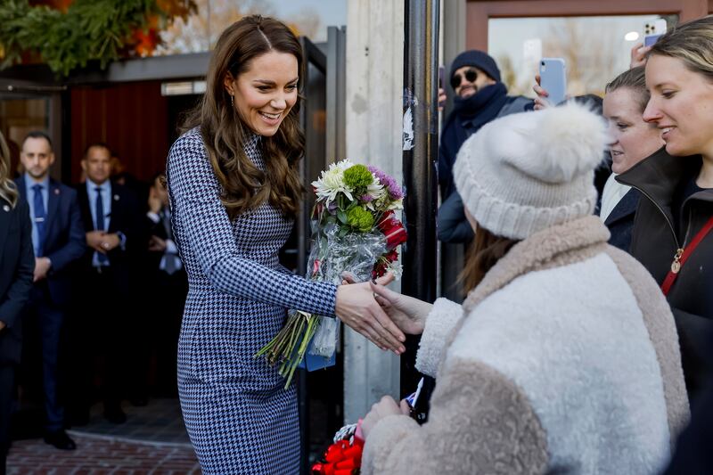 Kate greets well-wishers gathered outside after visiting the Centre on the Developing Child at Harvard University in Cambridge. AP