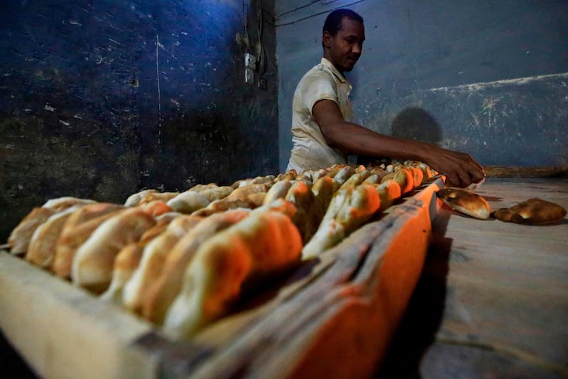Sudanese bakers prepare bread at a bakery in the town of Atbara, an industrial town 350 kilometres northeast of Sudan’s capital Khartoum. In December 2018, authorities raised the official price of a 70-gram loaf from one Sudanese pound to three, prompting a rush on bakeries and long queues for bread -- sparking the rallies that marked the beginning of the end for Bashir. A year since bread prices tripled overnight, sparking protests in the Sudanese town of Atbara, residents say bakeries are producing more loaves than the town can eat. AFP
