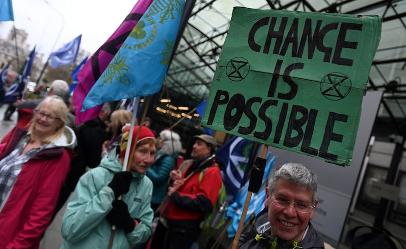 Extinction Rebellion protesters demonstrate against climate change outside the Energy Department in London. EPA