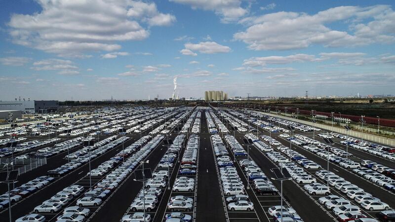 This photo taken on October 11, 2018 shows new BMW cars lined up at a BMW factory in Shenyang in China's northeastern Liaoning province.  German luxury carmaker BMW announced on October 11 a plan to take control of its China joint-venture, the first foreign automaker to take advantage of Beijing's new ownership rules for the sector. - China OUT
 / AFP / STR
