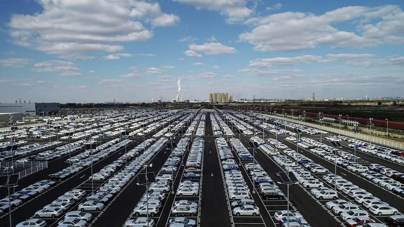This photo taken on October 11, 2018 shows new BMW cars lined up at a BMW factory in Shenyang in China's northeastern Liaoning province.  German luxury carmaker BMW announced on October 11 a plan to take control of its China joint-venture, the first foreign automaker to take advantage of Beijing's new ownership rules for the sector. - China OUT
 / AFP / STR
