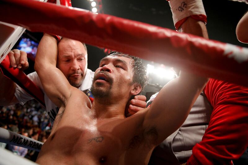 Manny Pacquiao celebrates his win against Adrien Broner in the WBA welterweight title boxing match Saturday, Jan. 19, 2019, in Las Vegas. (AP Photo/John Locher)